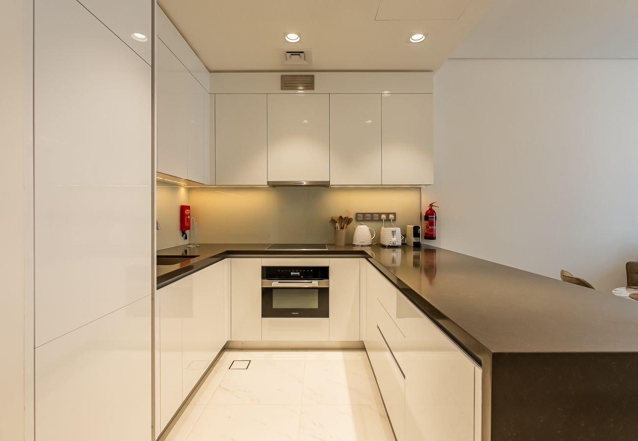 Apartment in Dubai - Modern 1-Bedroom Apartment with Lagoon & Burj Khalifa Views | District One, MBR City