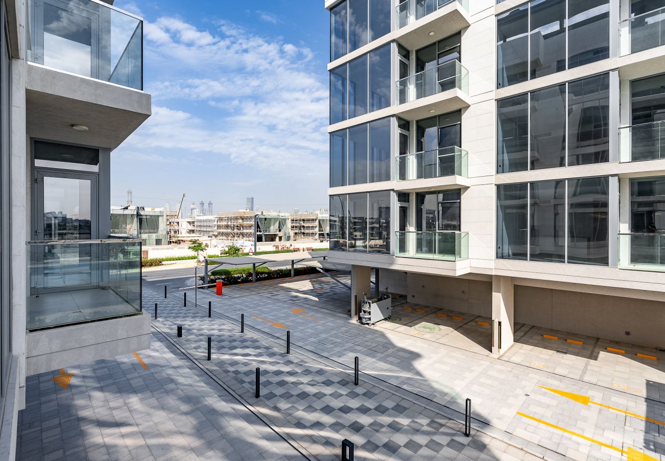 Apartment in Dubai - Modern 1-Bedroom Apartment with Lagoon & Burj Khalifa Views | District One, MBR City