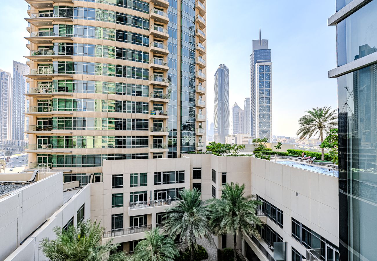 Apartment in Dubai - Stylish 2-Bedroom Apartment with Iconic Views | The Lofts, Downtown Dubai