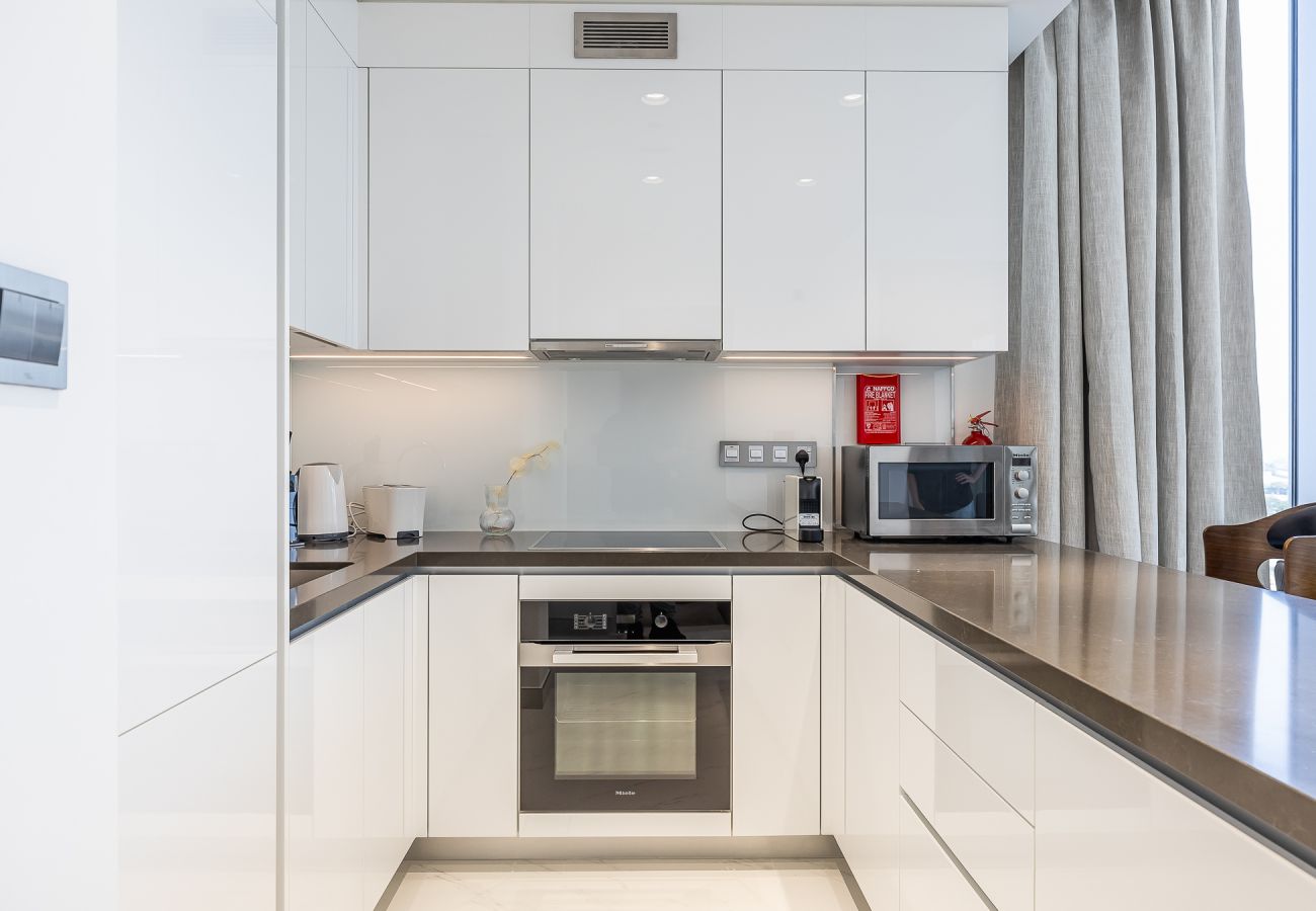 Апартаменты на Dubai - Modern 1-Bedroom Apartment with Lagoon Views | Residences 15 – District One