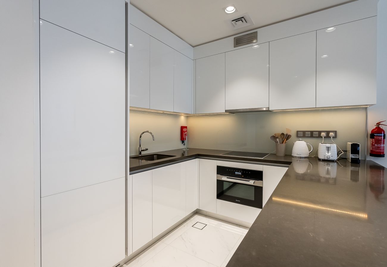 Апартаменты на Dubai - Modern 1-Bedroom Apartment with Lagoon & Burj Khalifa Views | District One, MBR City