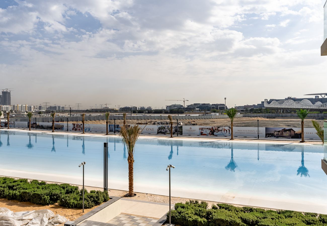 Апартаменты на Dubai - Modern 1-Bedroom Apartment with Lagoon & Burj Khalifa Views | District One, MBR City